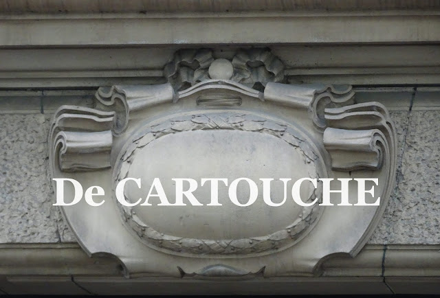 The Cartouche The ornament Cartouche, Baroque style ornaments, Cartouche, Wooden cartouche carved by Ornamental woodcarver for a decoration in wood or paneling. A wooden cartouche is always made by a woodcarver.