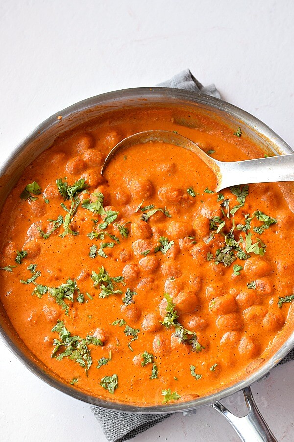 birds eye view of a pan with vegan chana tikka masala