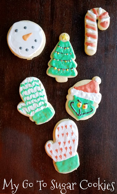 It is always fun to have a cookie cut in a pretty shaped and decorated with frosting, but you aren't limited to sugar cookies. There are lots of flavors and types of cookies you can roll and cut, here are a few of our favorite recipes. sugar cookies in Christmas shapes decorated with royal icing
