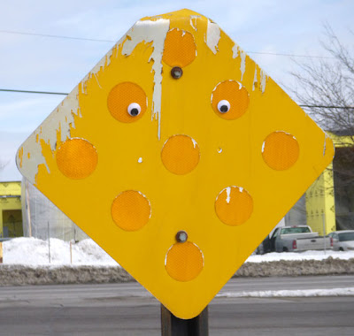 intersection sign with googly eyes