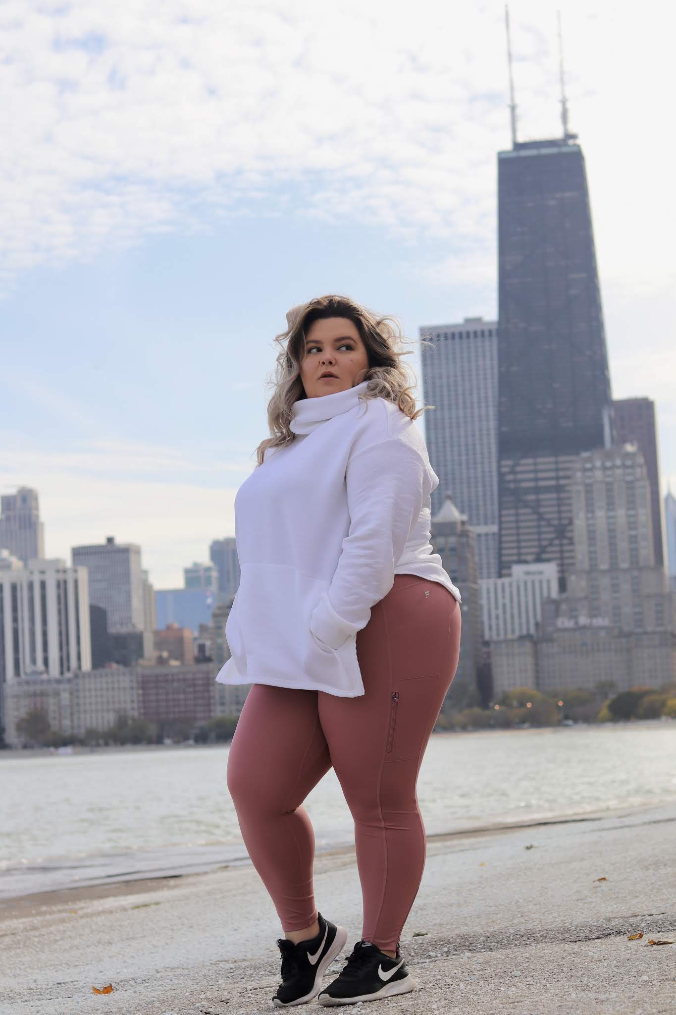 Chicago Plus Size Petite Fashion Blogger Natalie in the City shares a  Fabletics promo code 2020