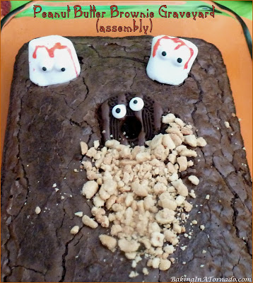 Peanut Butter Brownie Graveyard, a fun Halloween dessert for the chocolate and peanut butter lover. | Recipe developed by www.BakingInATornado.com | #recipe #Halloween