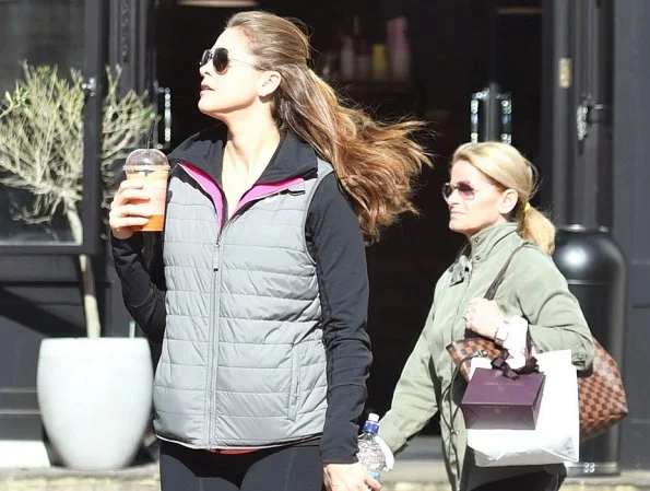 Princess Madeleine of Sweden was seen when she was walking with a beverage in downtown of London