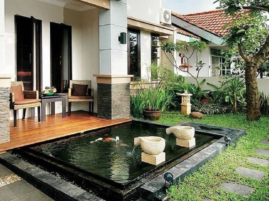 minimalist fish pond in front of the house