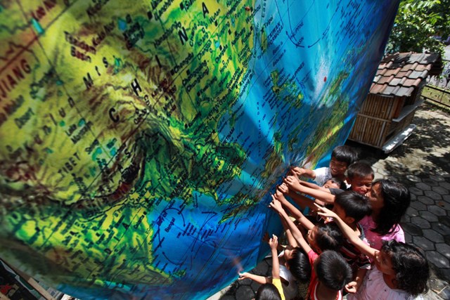 PTK GEOGRAFI KELAS XI SMA PENERAPAN MODEL THINK PAIR