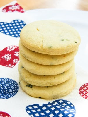 a stack of lemon and basil shortbread cookies