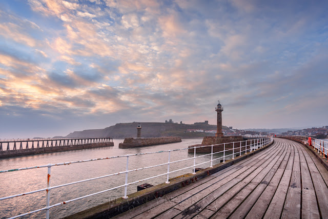 Old pier at sunrise in Whitby North Yorkshire by Martyn Ferry Photography