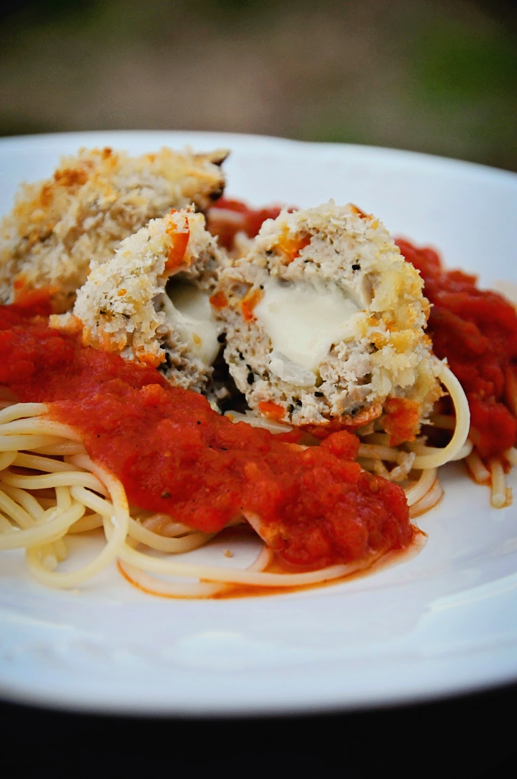 Barefoot and Baking Mozzarella Stuffed Chicken Meatballs