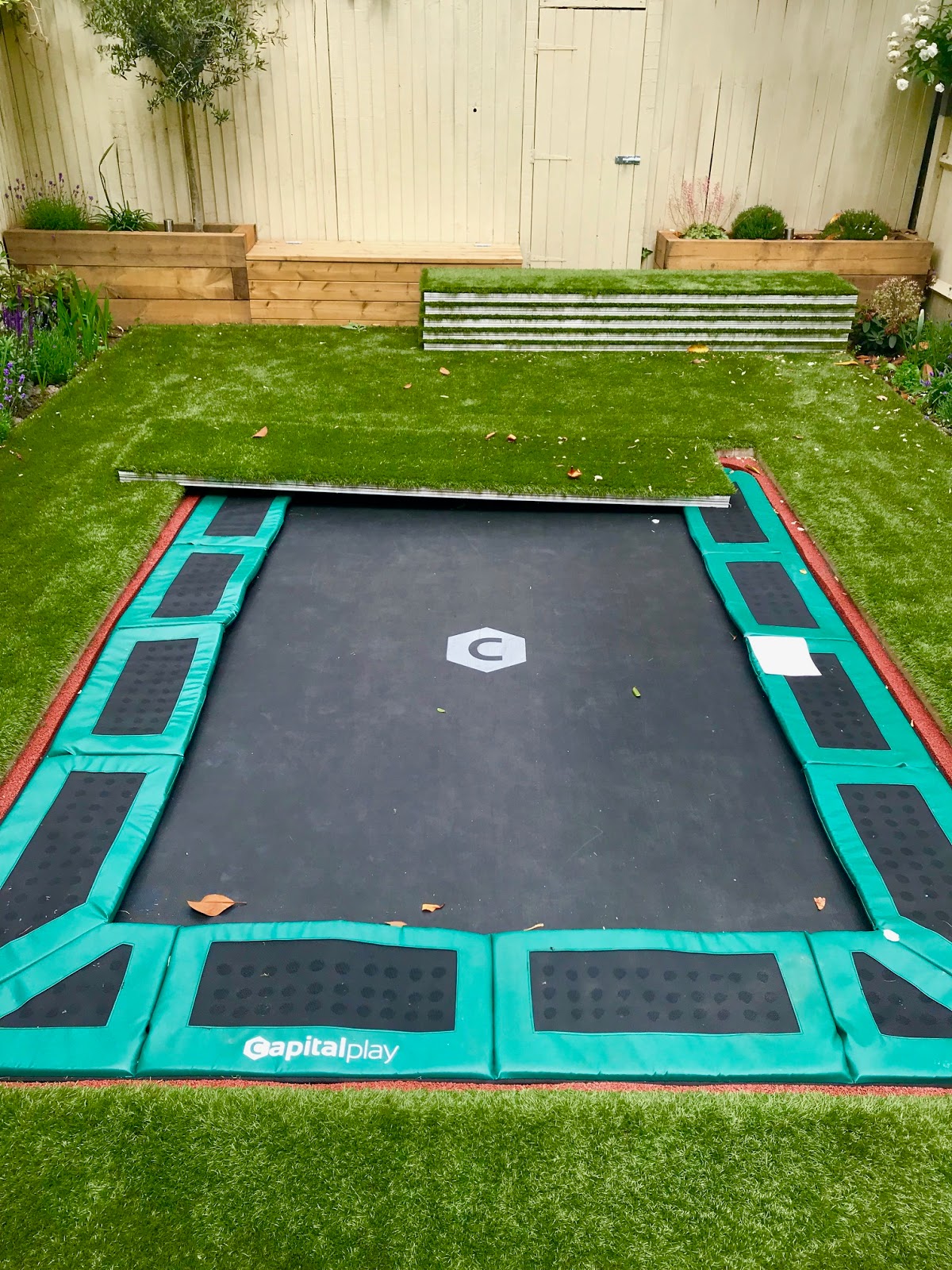 London Garden Designer Sunken trampoline with walk on aluminum lid