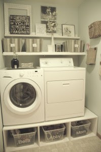 Laundry washer and dryer on pedestal with bins underneath :: OrganizingMadeFun.com