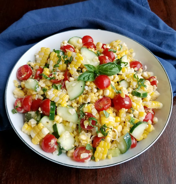 close up of serving bowl with summer corn salad close up of serving bowl with summer corn salad