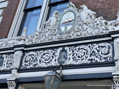 ornate Bank of Italy plaque on Boulevard restaurant building on Commonwealth Club Waterfront tour in San Francisco, California