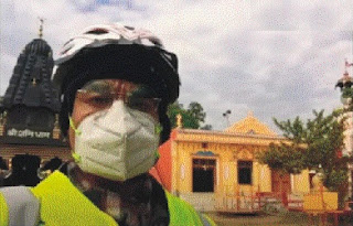 cycling for Temple of Sheetla Mata with mask