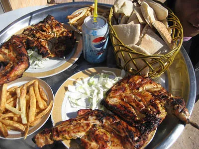 Grilled chicken served at a roadside restaurant in central Libya.