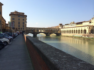 Looking along the Arno towards Ponte Vecchio in Florence, the backdrop for Michele Giuttari's book