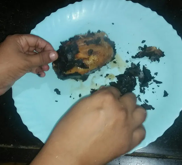 Removing-skin-from-roasted-baingan Removing-skin-from-roasted-baingan