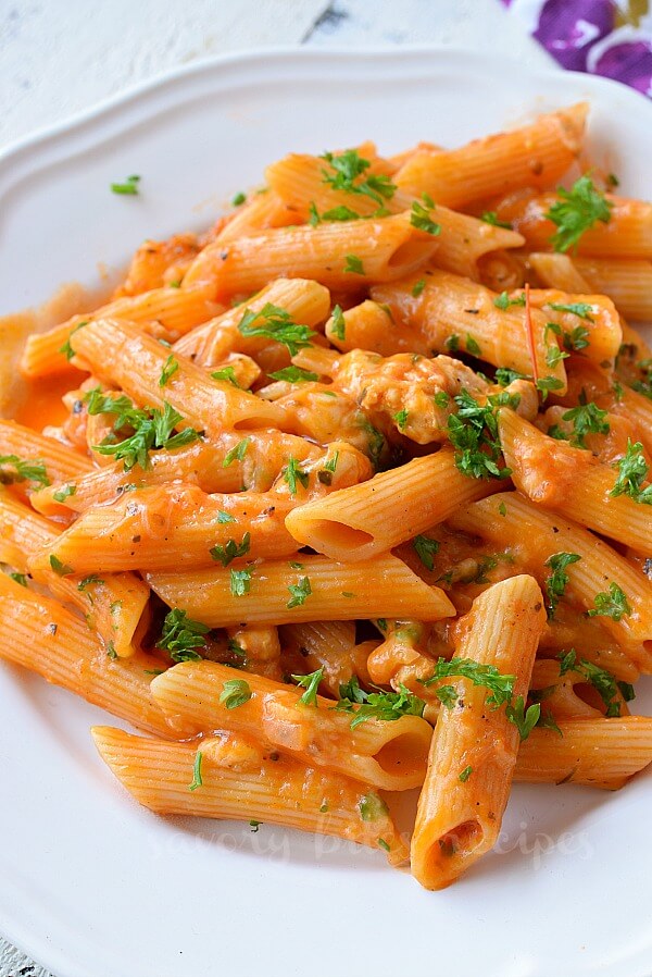 close up of plate with chicken parmesan pasta