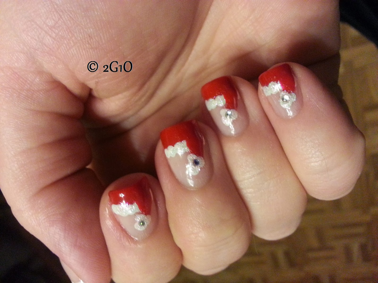 2. "Christmas Nail Designs with Santa Hats" - wide 3