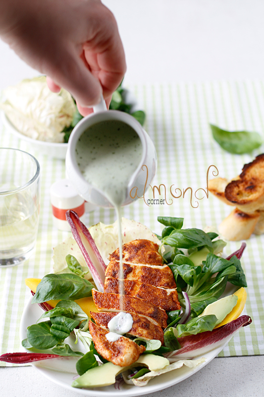 Almond Corner Cayenne pepper spiced chicken breast with avocado, mango, sesonal salads and