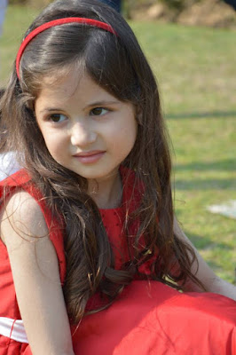 cute munni photo in red dress