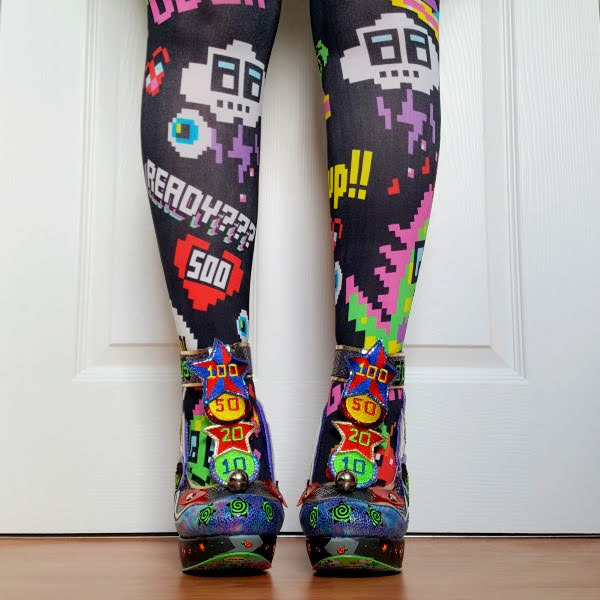 wearing pixel gaming themed tights with colourful pinball shoes