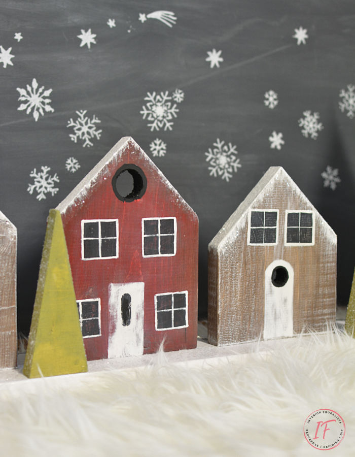 How to build a Scandinavian Village with rustic charm, an inexpensive Christmas decor idea for a fireplace mantel with salvaged scrap wood lumber.