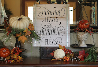  fall decor and pumpkins in the dining room