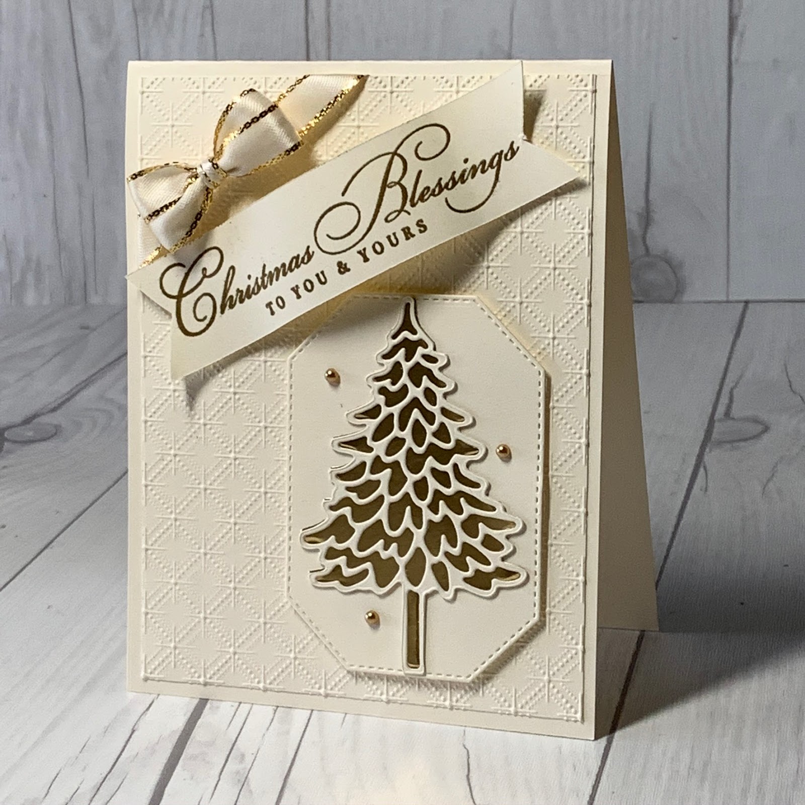 A touch of Gold Foil and the Pine Wood Dies create a stunning Christmas