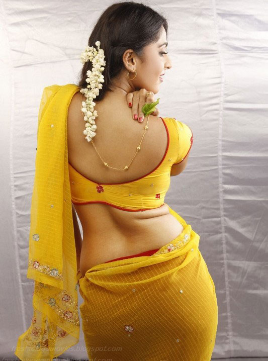 Anuskha+Shetty+Hot+Stills+In+Yellow+Sare