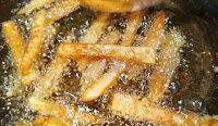 Deep frying potato fingers for honey chilli potato recipe