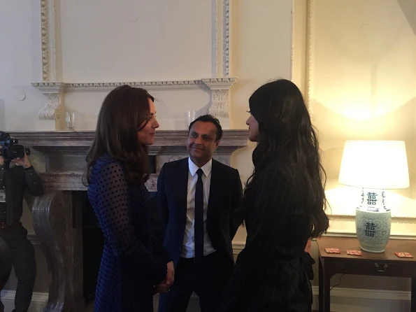 Prince William and his wife The Duchess of Cambridge attended a reception with young people from India and Bhutan at Kensington Palace, Kate Middleton wore SALONI Mary Illusion Dot Dress