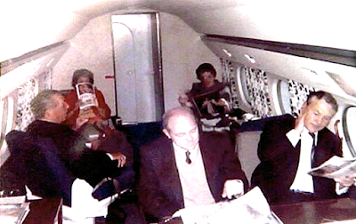 walt disney and guests aboard airplane