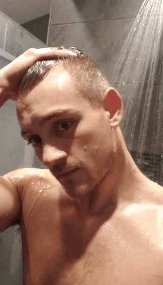 shirtless-shower-guy-biceps-flex-selfie-gif