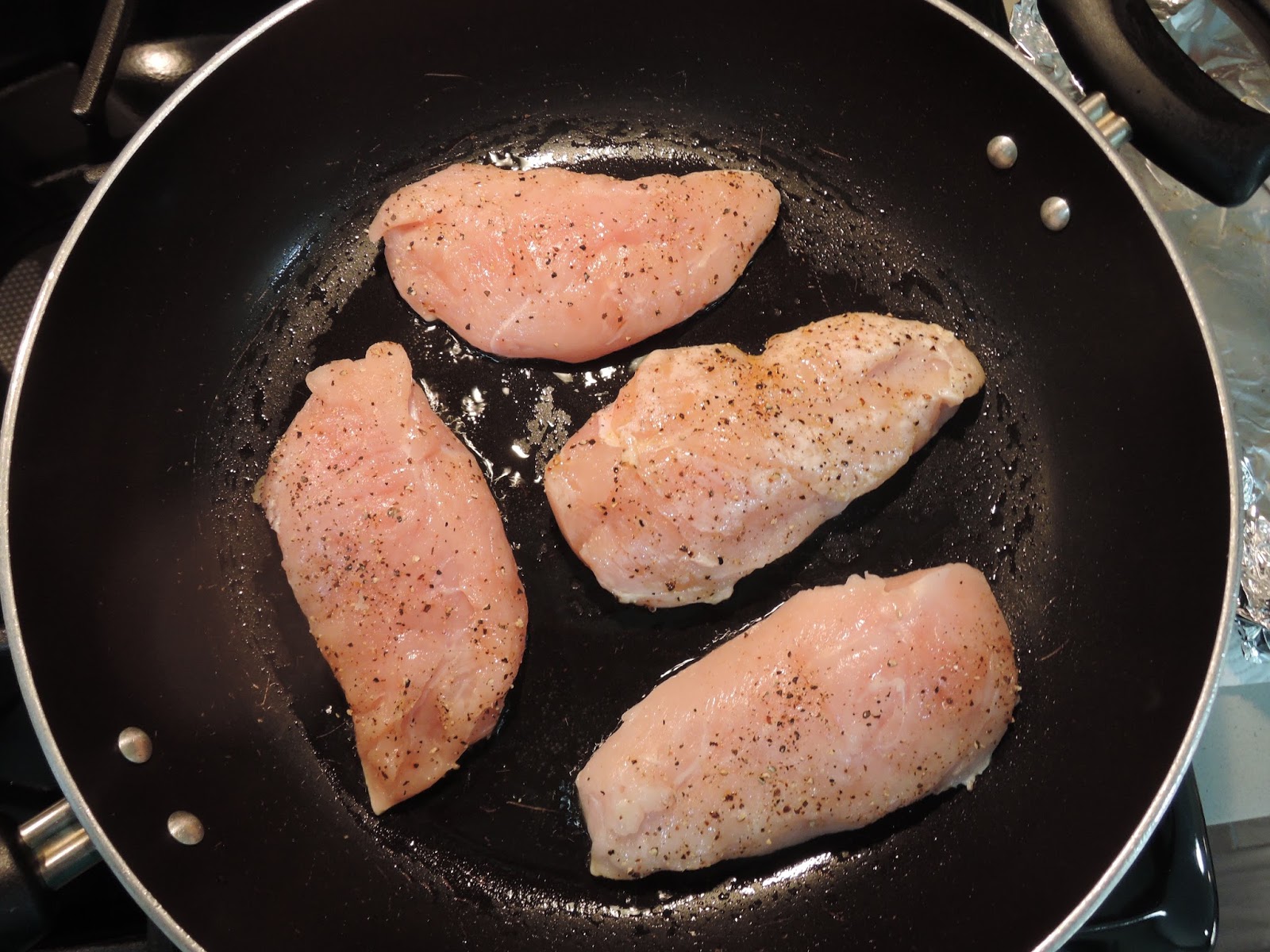 The Briny Lemon PanSeared Chicken Breasts with Brandy Cream Sauce