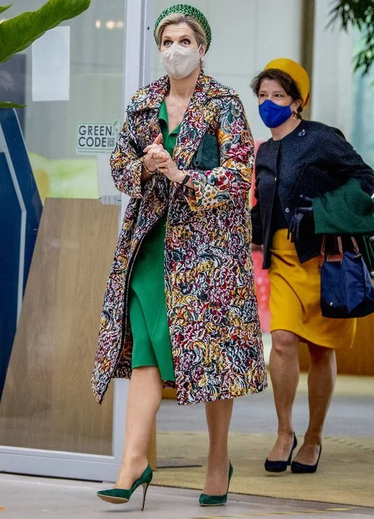 Queen Maxima wore a long floral brocade coat from Oscar de la Renta. and new green dress from Natan