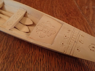 Southeast Asian canoe model, decorative details