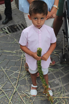 Niño con uncia trenzada  en el Corpus de Olvera 2019