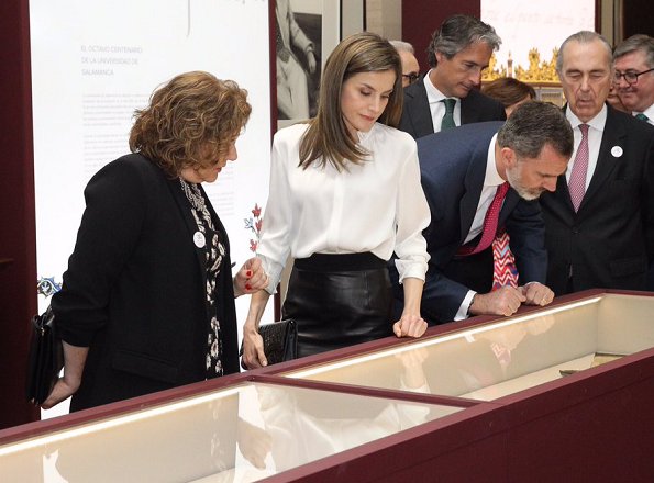 Queen Letizia wore Hugo Boss Sepai leather skirt, Boss blouse, Magrit Leather Pumps, Felipe Varele clutch and Tous pearl earrings