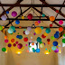 DIY: colorful paper lanterns hang over reception tables