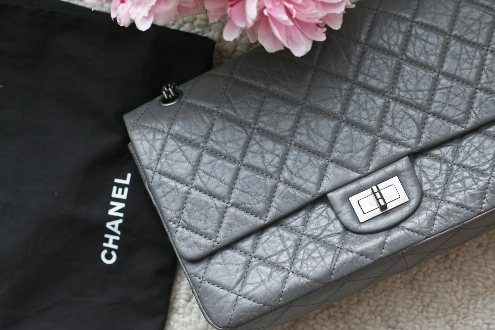 The REAL Story Behind The Chanel 2.55 Flap Bag