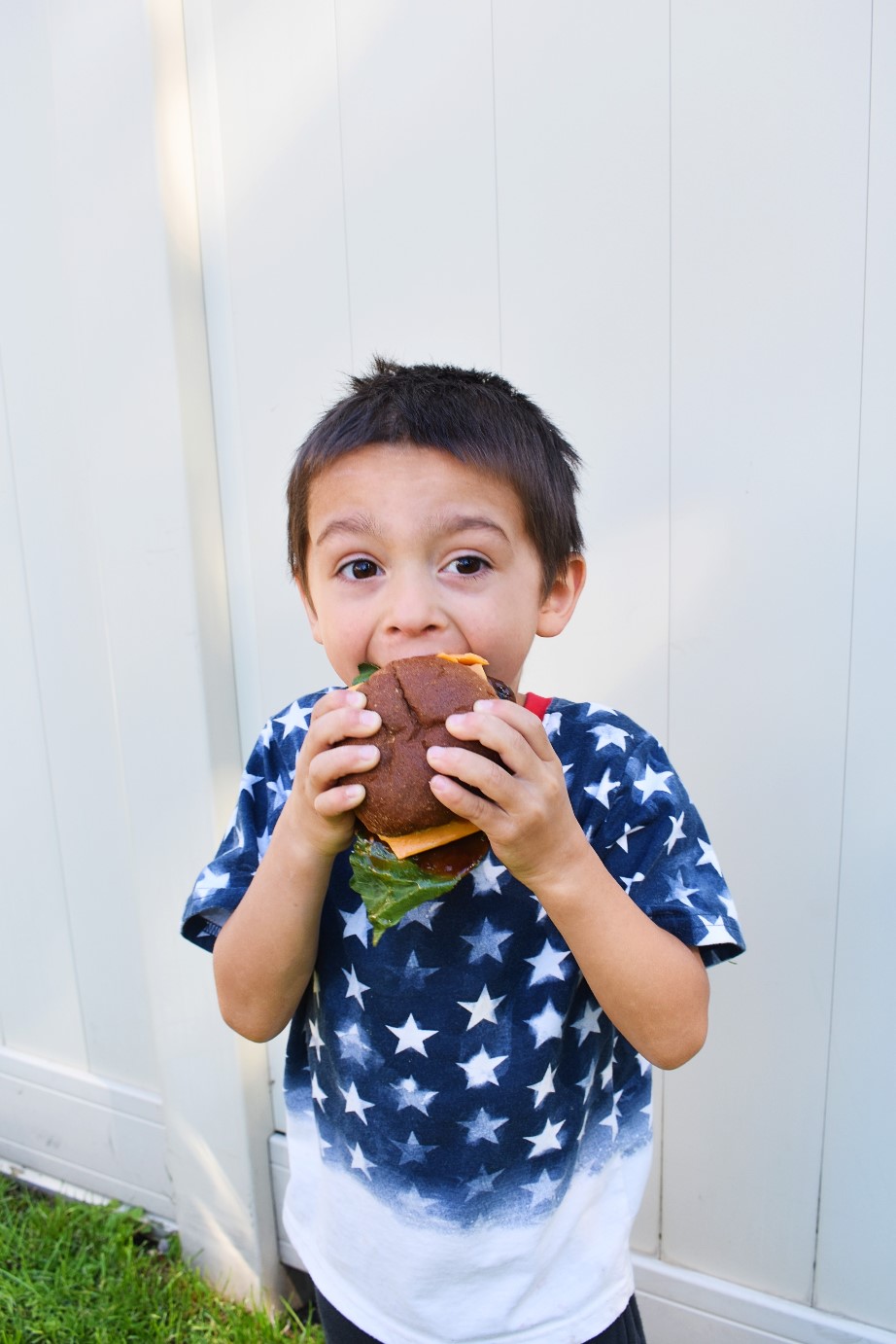 boy eating a burger