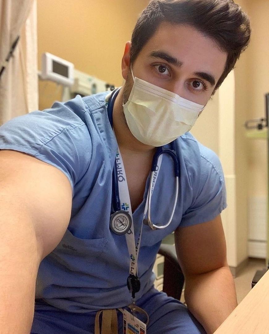 cute-male-nurse-taking-selfie-while-working-pretty-eyes