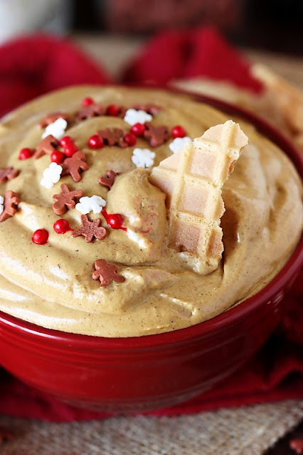 Dipping Into Creamy Gingerbread Dip with Waffle Cone Pieces Image