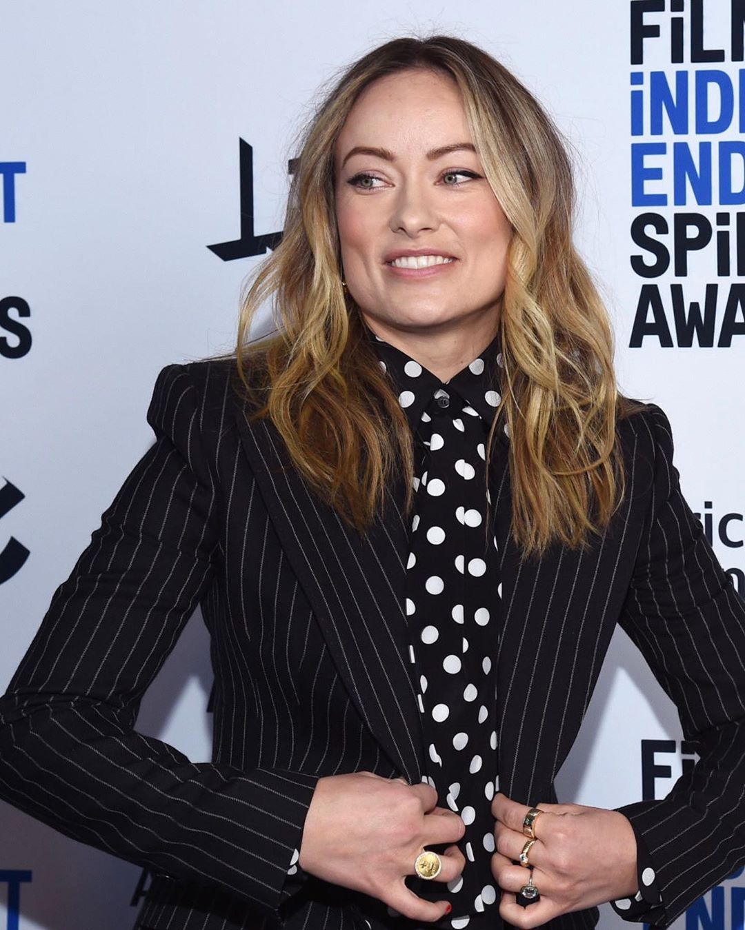 Olivia Wilde makes a statement in black pinstripe suit and polkadot
