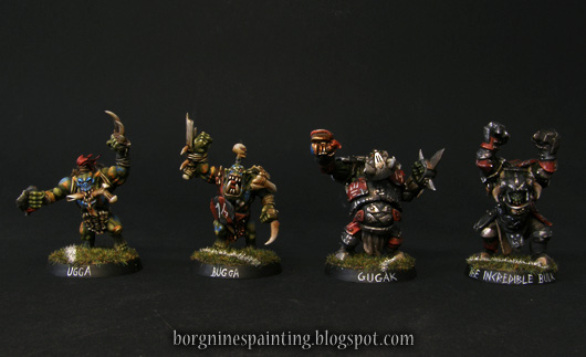4 painted miniatures for Blood Bowl, 2 Orc Blitzers for Bloodbowl converted out of Savage Orcs for AoS and 2 Black Orc Blockers converted out of Ardboyz for AoS, both sets kitbashed a bit.
