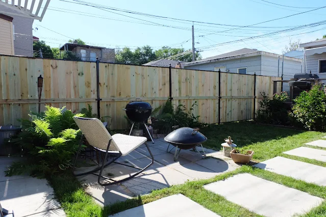 new backyard wood and metal fence