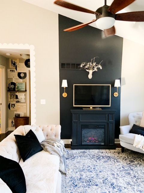 Black floor to ceiling fireplace