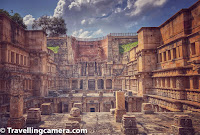 As you go down, the depth of the stepwell increases but the grandeur keeps on surprising you after each step you take downwards. Above photograph is probably clicked from 4th level of stepwell from top and here you see only the top parts of different levels in layered manner. the extreme end of the photograph shows top of the core level (7th level of Rani ki Vav). This section is closed so you can't explore that well. It's mainly for restoration and ensuring that it's preserved well. Hope that ASI figure out a way to open this section for visitors in a way that things don't get damaged in that process.