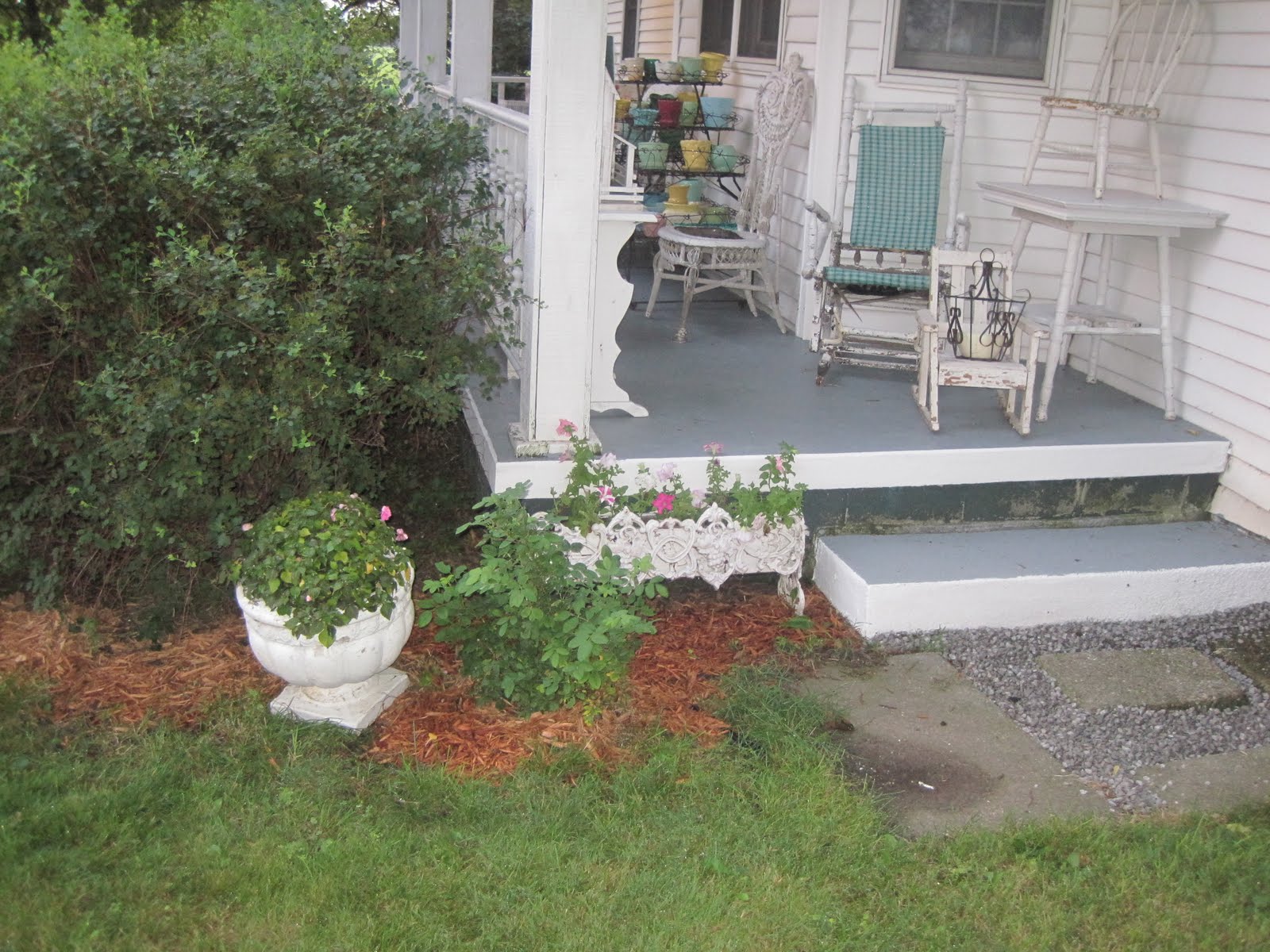 Ella Mae's Adding Mulch Around the House