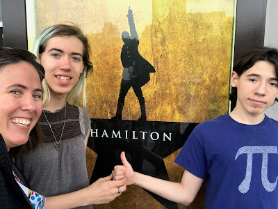 Me, Katie, and Jack in front of the Hamilton poster
